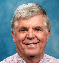 A person with grey hair and a plaid shirt

AI-generated content may be incorrect.